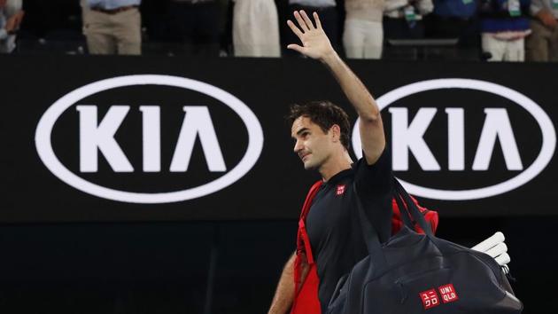 Switzerland's Roger Federer waves as he leaves the court after his match against Serbia's Novak Djokovic.(REUTERS)