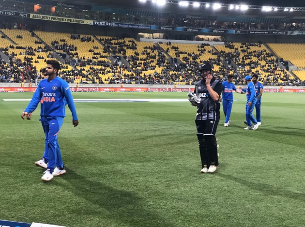 Colin Munro walks back after Super Over. (@BLACKCAPS)