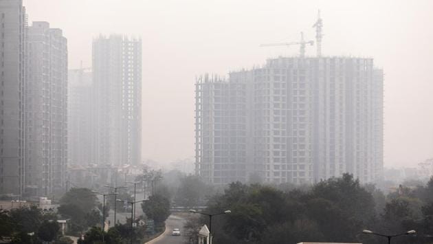 Cranes operate at a property development in Noida, Uttar Pradesh. One such sprawling 1,063-acre property development in Noida, Wish Town was once a sought-after destination for an aspiring middle class seeking a slice of the “good days” promised in 2014, when Prime Minister Narendra Modi swept to power. Now, it’s a symbol of lost hope. (Prashanth Vishwanathan / Bloomberg) Cranes operate at a property development in Noida, Uttar Pradesh. One such sprawling 1,063-acre property development in Noida, Wish Town was once a sought-after destination for an aspiring middle class seeking a slice of the “good days” promised in 2014, when Prime Minister Narendra Modi swept to power. Now, it’s a symbol of lost hope. (Prashanth Vishwanathan / Bloomberg)