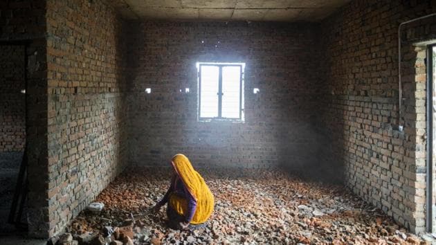 A labourer at the Wish Town construction site. As lenders choked off credit, domestic spending took a knock. It wasn’t too long before growth numbers were hit. Sherry Addvant, 39, public relations executive told Bloomberg she forks out ₹25,000 rupees a month to rent an apartment while still paying off a mortgage of ₹80,000 for a home in Wish Town that hasn’t been built six years after the purchase. (Prashanth Vishwanathan / Bloomberg) A labourer at the Wish Town construction site. As lenders choked off credit, domestic spending took a knock. It wasn’t too long before growth numbers were hit. Sherry Addvant, 39, public relations executive told Bloomberg she forks out ₹25,000 rupees a month to rent an apartment while still paying off a mortgage of ₹80,000 for a home in Wish Town that hasn’t been built six years after the purchase. (Prashanth Vishwanathan / Bloomberg)
