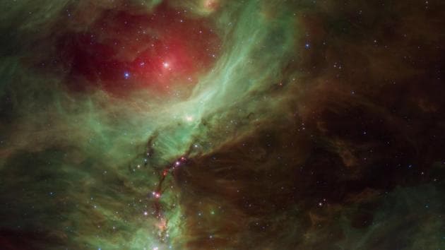 An active stellar nursery containing thousands of young stars and developing protostars, near the sword of the constellation Orion, captured by the Spitzer Space Telescope. (AP) An active stellar nursery containing thousands of young stars and developing protostars, near the sword of the constellation Orion, captured by the Spitzer Space Telescope. (AP)