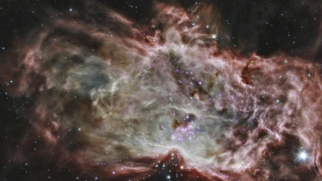 The cluster NGC 2024, which is found in the center of the Flame Nebula about 1,400 light years from Earth was captured by Spitzer Space Telescope. “It wasn’t in the plan to have Spitzer operating so far away from Earth, so the team has had to adapt year after year to keep the spacecraft operating,” said Joseph Hunt, Spitzer project manager. “But I think overcoming that challenge has given people a great sense of pride in the mission. This mission stays with you,” Hunt said. (AP) The cluster NGC 2024, which is found in the center of the Flame Nebula about 1,400 light years from Earth was captured by Spitzer Space Telescope. “It wasn’t in the plan to have Spitzer operating so far away from Earth, so the team has had to adapt year after year to keep the spacecraft operating,” said Joseph Hunt, Spitzer project manager. “But I think overcoming that challenge has given people a great sense of pride in the mission. This mission stays with you,” Hunt said. (AP)