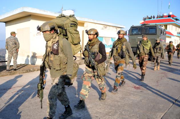 Army soldiers arrive to take position at encounter site at Nagrota toll plaza, where a group of 3-4 militants travelling in a truck opened fire at a police team, on the Jammu-Srinagar national highway.(Nitin Kanotra / Hindustan Times) Army soldiers arrive to take position at encounter site at Nagrota toll plaza, where a group of 3-4 militants travelling in a truck opened fire at a police team, on the Jammu-Srinagar national highway.(Nitin Kanotra / Hindustan Times)