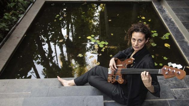 Floy Krouchi, a sound artiste, has designed an augmented bass (seen in pic), which is an instrument that integrates technology and the sound of the Rudra Veena.(Pratham Gokhale/HT Photo)