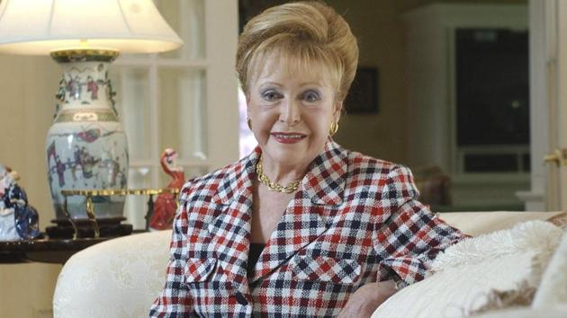FILE - In this June 3, 2004 file photograph, author Mary Higgins Clark poses in her home in Saddle River, N.J. Clark, the tireless and long-reigning "Queen of Suspense" whose tales of women beating the odds made her one of the world's most popular writers, died Friday, Jan. 31, 2020, at age 92. Clark's publisher, Simon & Schuster, announced that Clark died in Naples, Fla, of natural causes. (AP Photo/Mike Derer, File) (AP) FILE - In this June 3, 2004 file photograph, author Mary Higgins Clark poses in her home in Saddle River, N.J. Clark, the tireless and long-reigning "Queen of Suspense" whose tales of women beating the odds made her one of the world's most popular writers, died Friday, Jan. 31, 2020, at age 92. Clark's publisher, Simon & Schuster, announced that Clark died in Naples, Fla, of natural causes. (AP Photo/Mike Derer, File) (AP)