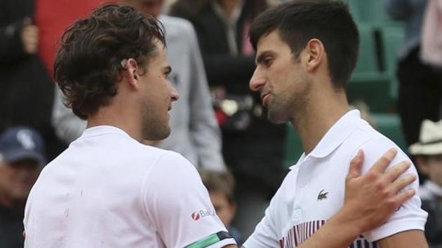 Serbia's Novak Djokovic with Austria's Dominic Thiem. (AP) Serbia's Novak Djokovic with Austria's Dominic Thiem. (AP)