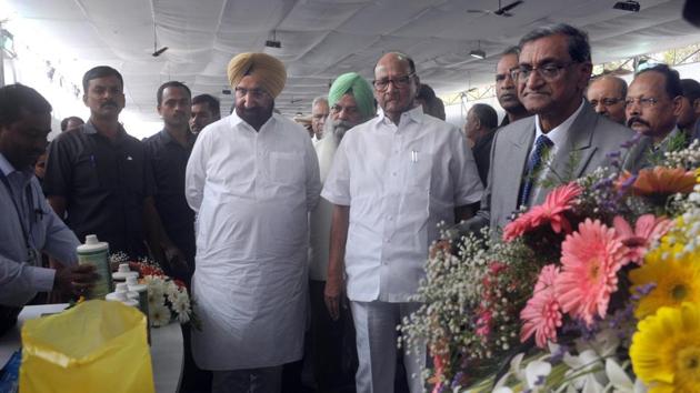 Sharad Pawar and Sukhjinder Singh Randhwa, minister from Punjab during 2nd International Conference on Sustainability - Innovation & Diversification in Sugar and Allied Industry at Manjari on Saturday.(HT PHOTO)