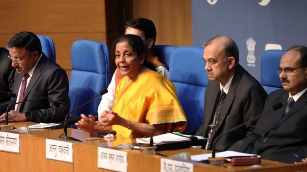 Nirmala Sitharaman, India's finance minister, center, gestures as she speaks during a news conference in New Delhi. (Bloomberg) Nirmala Sitharaman, India's finance minister, center, gestures as she speaks during a news conference in New Delhi. (Bloomberg)