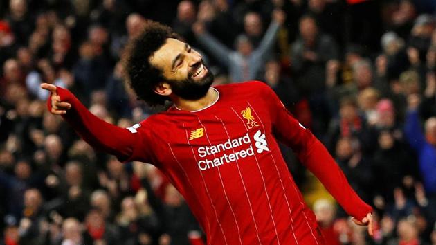 Liverpool's Mohamed Salah celebrates scoring their fourth goal.(REUTERS)