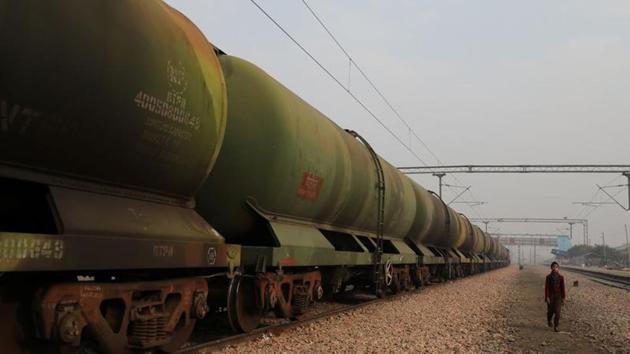 A boy walks past an oil tanker train stationed in Ghaziabad. In her budget speech, Nirmala Sitharaman has said that the Indian Railways will set up Kisan Rail through PPP model to build a seamless national cold supply chain for perishables and for their quick transportation. ‘One product for one district’: the FM highlighted on better marketing and export specialisation. (Anushree Fadnavis / REUTERS) A boy walks past an oil tanker train stationed in Ghaziabad. In her budget speech, Nirmala Sitharaman has said that the Indian Railways will set up Kisan Rail through PPP model to build a seamless national cold supply chain for perishables and for their quick transportation. ‘One product for one district’: the FM highlighted on better marketing and export specialisation. (Anushree Fadnavis / REUTERS)