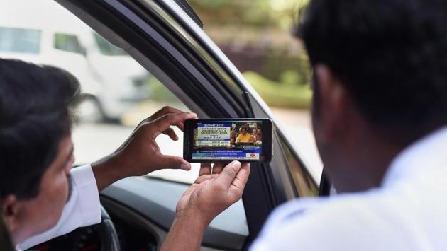 Taxi drivers watch live telecast of the Union Budget session 2020, in Chennai. (PTI) Taxi drivers watch live telecast of the Union Budget session 2020, in Chennai. (PTI)