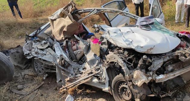 Mangled remains of the car after the accident along Pandharpur-Malshiraj road, Solapur on Saturday. (HT/PHOTO) Mangled remains of the car after the accident along Pandharpur-Malshiraj road, Solapur on Saturday. (HT/PHOTO)