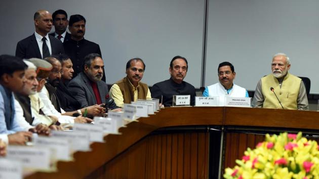 Prime Minister Narendra Modi and Union Minister of Parliamentary Affairs Pralhad Joshi in conversation with leader of opposition Rajya Sabha Ghulam Nabi Azad, leader of opposition Lok Sabha Adhir Ranjan Chowdhury, at an all Party Meeting before the Parliament Budget Session in New Delhi. (Sonu Mehta / HT Photo)