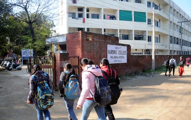 There are no beds, light bulbs or fans available in the hostel rooms, say students.(HT PHOTO)