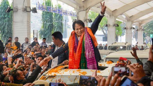 National Democratic Front of Boroland (NDFB) leader Dhiren Boro displays victory sign on his arrival, after signing Bodo Peace Accord 2020 between NDFB, Assam government and Central government in Delhi, at Lokopriya Gopinath Bordoloi International Airport, Borjar in Guwahati, Assam. (PTI)
