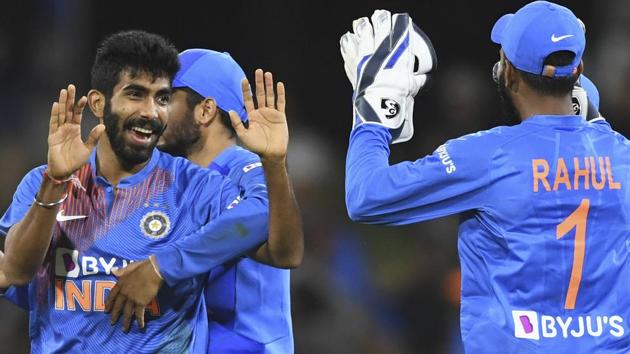 India's Jasprit Bumrah, left, celebrates with team mates the wicket of Mitchell Santner. (AP) India's Jasprit Bumrah, left, celebrates with team mates the wicket of Mitchell Santner. (AP)