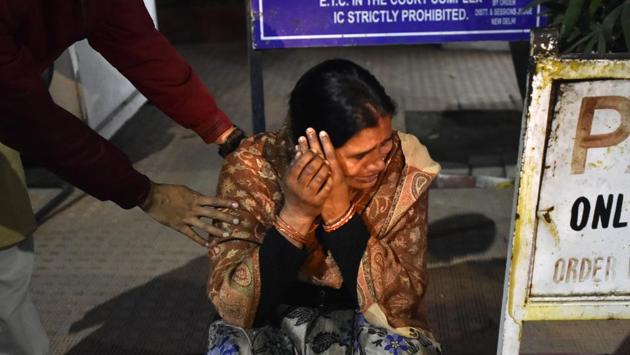 Asha Devi, mother of the Delhi gang rape victim breaks down after a Delhi court stayed the execution of the four men who had been convicted in the case, at Patiala House Court, in New Delhi. (Sonu Mehta / HT Photo)