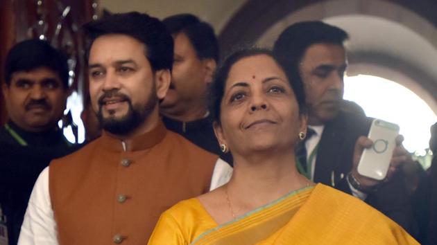 Minister of Finance Nirmala Sitharaman seen holding the bahi khata along with Minister of State in the Ministry of Finance Anurag Thakur. (Sonu Mehta/HT PHOTO) Minister of Finance Nirmala Sitharaman seen holding the bahi khata along with Minister of State in the Ministry of Finance Anurag Thakur. (Sonu Mehta/HT PHOTO)