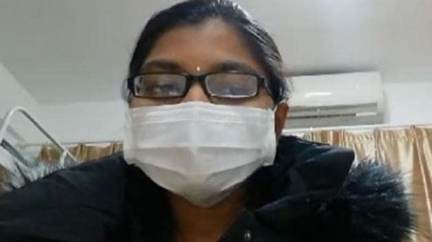 The woman, who can be seen with her face covered in a mask, says in the video that she and her colleague do not have any symptom of the fast-moving coronavirus.(Video/Screengrab)