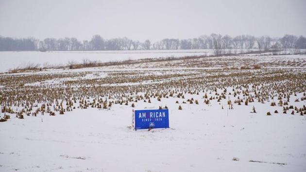 A sign seen in a field, on a farm, in West Liberty. “Our long-term goal is to keep doing the same thing through the November election and beyond. We want to keep the momentum going,” said Nick Salazar, state director of LULAC and state co-chairman of the Bernie Sanders presidential campaign. (Eric Thayer / REUTERS)