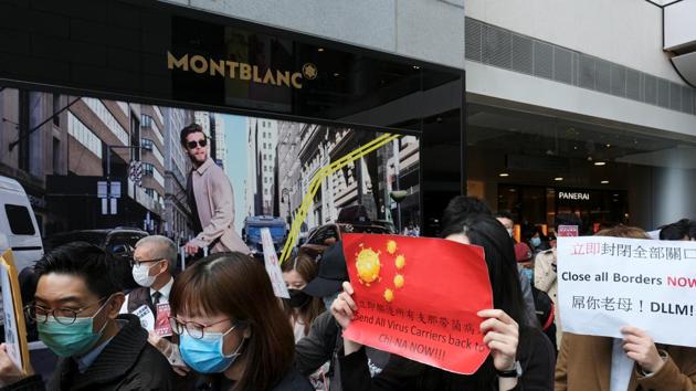 Supporters of medical workers hold a flash mob protest to back their strike to demand Hong Kong closing its border with China to reduce the coronavirus spreading, in Hong Kong, China. (REUTERS) Supporters of medical workers hold a flash mob protest to back their strike to demand Hong Kong closing its border with China to reduce the coronavirus spreading, in Hong Kong, China. (REUTERS)