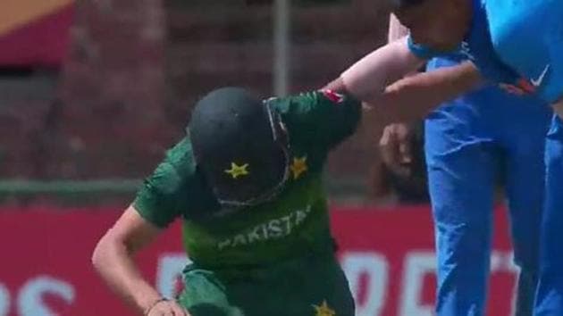 India’s Sushant Mishra with Pakistan’s Haider Ali during the ICC U19 World Cup semi-final.(Twitter)