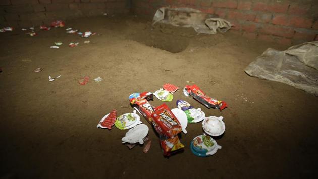An underground bunker is seen at Batham’s house. The older children were asked to hold the toddlers in their arms as they awkwardly descended into the dark lair using a rickety bamboo ladder. “The moment all of us climbed down in the bunker, he bolted the lid from above and stopped the music. He screamed to say that he wanted revenge for being framed in the theft,” said Akash Kateria, also 13. (Burhaan Kinu / HT Photo)