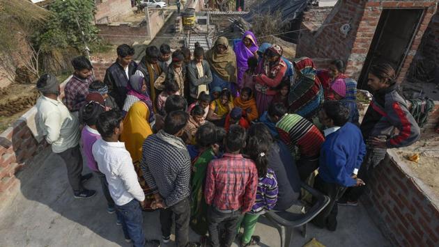 Around 2.30pm, Babli Devi walked to the house to call her three kids home. “I found the red iron door locked from inside and Subhash screaming. He asked me to gather all the villagers and call the police. He said the children would be blown up if I didn’t listen to him,” said Babli. To make his intent clear, Batham allegedly fired a round through a tiny shaft under the main door but didn’t hit anyone. (Burhaan Kinu / HT Photo)