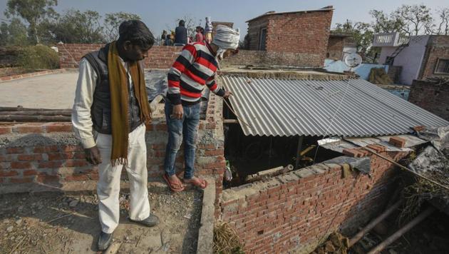 Batham’s motives remain unclear. Vineet said he heard Batham name five villagers — including a local policeman – and asked them to be brought before him. “He said that these men had framed him in the recent theft case and that the policeman had beaten him up,” said Vineet. (Burhaan Kinu / HT Photo)
