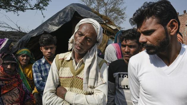 When villagers and policemen surrounded the home, among Batham’s first demands was to summon legislator Nagendra Singh. The MLA was at the spot in no time, but was cautious not to approach the door. “I stood next to the wall and asked Anupam Dubey to speak to Subhash,” said the MLA. As the night dragged on, the authorities kept Batham engaged. “If one topic got over, we would initiate another. Our aim was to tire him out,” said Singh. (Burhaan Kinu / HT Photo)