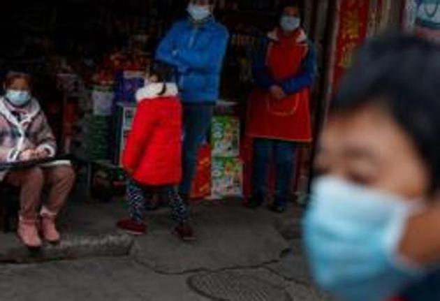 People wear protective masks as China is hit by an outbreak of novel coronavirus. The new suspected case from Pune is a 36-year-old male Indian national, who lived in Hong Kong. (REUTERS) People wear protective masks as China is hit by an outbreak of novel coronavirus. The new suspected case from Pune is a 36-year-old male Indian national, who lived in Hong Kong. (REUTERS)