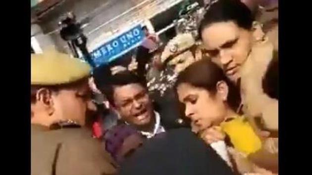 According to reports, protesters said the woman kept asking questions and that some of them found a camera on her. (Photo: Twitter) According to reports, protesters said the woman kept asking questions and that some of them found a camera on her. (Photo: Twitter)