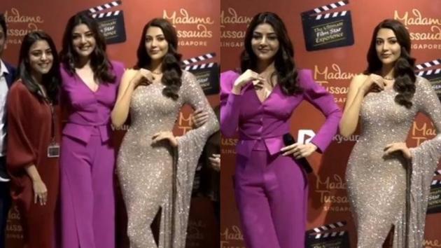 Kajal Aggarwal with her wax statue at Madame Tussauds, Singapore.