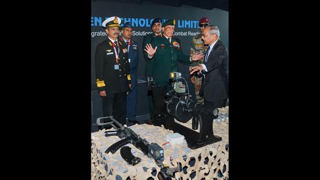 Chief of Defence Staff (CDS) Gen Bipin Rawat at a stall during the DefExpo. The fifth India-Russia Military Industry Conference is also being held on the sidelines of the DefExpo, over 100 Russian and over 200 Indian industry leaders are expected to participate in the conference. (PTI)