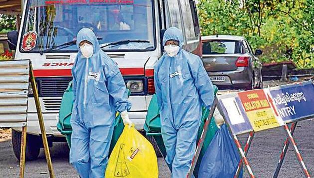 Medical staff at an isolation ward at Kochi Medical College in Kerala on Tuesday. (PTI) Medical staff at an isolation ward at Kochi Medical College in Kerala on Tuesday. (PTI)