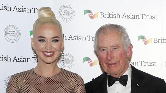 Britain's Prince Charles, Royal Founding Patron of the British Asian Trust, meets American musician Katy Perry as they arrive to attend a reception for supporters of the British Asian Trust in London. (AP) Britain's Prince Charles, Royal Founding Patron of the British Asian Trust, meets American musician Katy Perry as they arrive to attend a reception for supporters of the British Asian Trust in London. (AP)