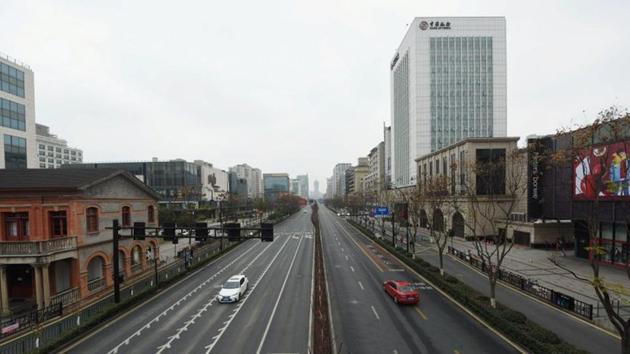 Cars seen on Yanan Road, a main commercial area in Hangzhou, after the city imposed new measures to prevent and control the new coronavirus, in Zhejiang province. Reuters reports that several countries, including the United States, have banned entry to visitors who have been in China over the previous two weeks. (China Daily / REUTERS)