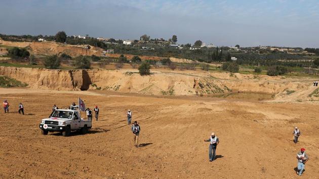 Citing security concerns, Israel has for years designated a 100 metre by 300 metre strip along its 40km-long fence at the frontier as off-limits to Palestinians in Gaza, an enclave ruled by the Hamas militant group. Palestinians say the policy has deprived them of large areas of farmland, cut into livelihoods and reduced the space available to the densely populated strip’s two million residents. (Ibraheem Abu Mustafa / REUTERS)