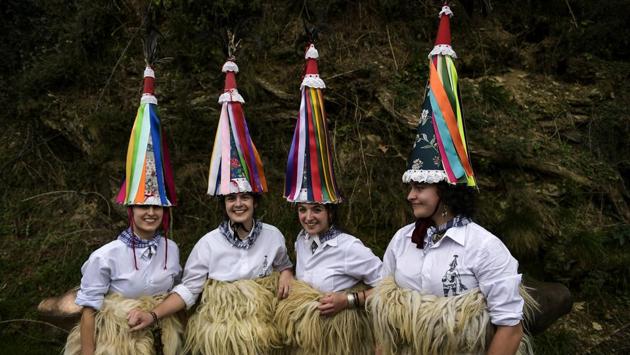 A group of “Joaldunak” pose for a photograph as they take part in a Carnival. (Alvaro Barrientos / AP)