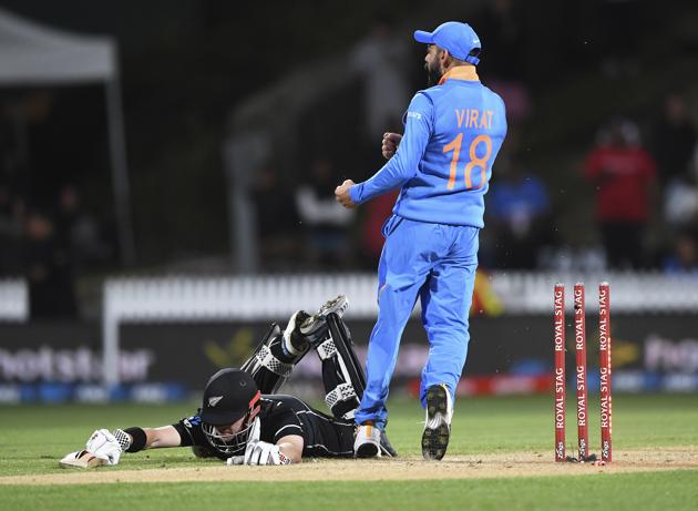 Virat Kohli celebrates running out Nicholls during the One Day cricket international between India and New Zealand at Seddon Oval in Hamilton (AP)