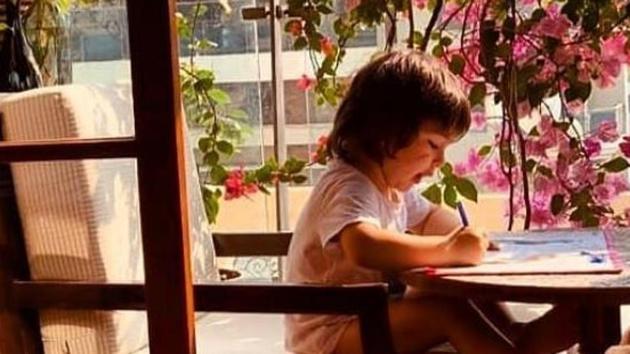 Kareena Kapoor’s son Taimur Ali Khan is seen colouring in this new picture.(Instagram)