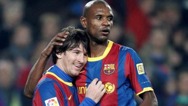 Eric Abidal (R) along with Lionel Messi.(REUTERS)