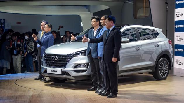 Hyundai Motor India launched a new version of its premium SUV Tucson. While unveiling the model at the Auto Expo, Hyundai Motor India managing director and CEO SS Kim said the new Tucson strengthens the company’s dominance in this segment in the country. (Money Sharma / AFP)