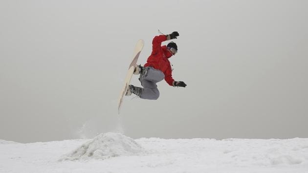 Mohammad Farzad, 20, a member of the Afghanistan Snowboarding Federation practices on the hillside known as Kohe Koregh, on the outskirts of Kabul. While Afghanistan’s capital may seem an unlikely destination for snowboarders, a group of young Afghans is looking to put the city on the winter sports map and change perceptions about their war-weary nation. (Rahmat Gul / AP)