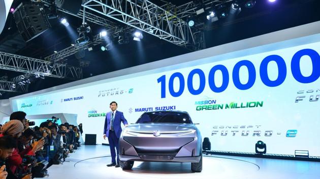 Maruti’s managing director Kenichi Ayukawa unveils the concept Furturo - e at the Auto Expo 2020. The 15th edition of Asia’s largest automobile show in terms of visitor kicked-off in Greater Noida on Wednesday with many auto companies, start-ups, telecom, alternate fuel, electric vehicle and social media firms participating at the mega event. (Ramesh Pathania / Mint)