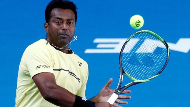 India's Leander Paes in action during the match against Germany's Anna-Lena Groenefeld and Colombia's Robert Farah.(REUTERS)