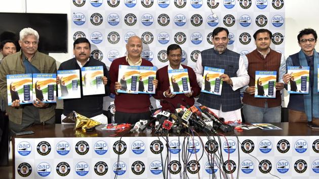 Aam Admi Party (AAP) Convener Arvind Kejriwal along with other senior leaders release party manifesto for upcoming Delhi Assembly election. AAP began its campaign early. Back in September 2019, the party started the first phase of its election outreach, holding several janta samvaad (public interaction) programmes at the booth, assembly and even organisational levels. (Mohd Zakir / HT Photo)