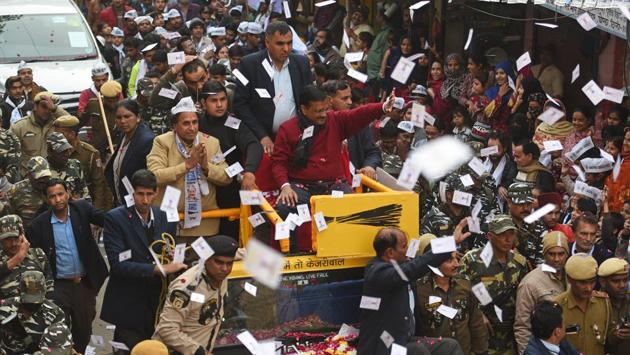 Delhi chief minister Arvind Kejriwal during his road show for the upcoming Vidhan Sabha elections, at Ghonda. On the last day of the campaign, Aam Aadmi Party (AAP) leader and chief minister Arvind Kejriwal held a press conference, seeking the support of voters for what he called “a new kind of politics based on performance”. (Sanchit Khanna / HT Photo)