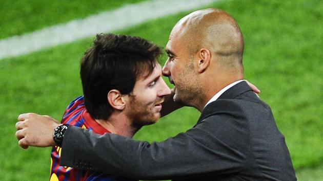 File image: Lionel Messi of FC Barcelona (R) shakes hands with Josep Guardiola (Getty Images) File image: Lionel Messi of FC Barcelona (R) shakes hands with Josep Guardiola (Getty Images)