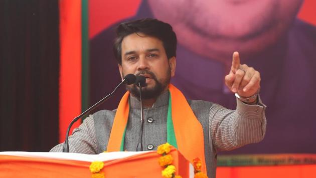 Minister of state for finance and Corporate Affairs Anurag Thakur addresses an election campaign at Rithala. Anurag Thakur encouraged the chanting of provocative “shoot the traitors” slogans and Delhi MP Parvesh Verma said that protesters will “enter your houses, they will pick up your sisters and daughters, rape them and kill them”. (HT Photo)